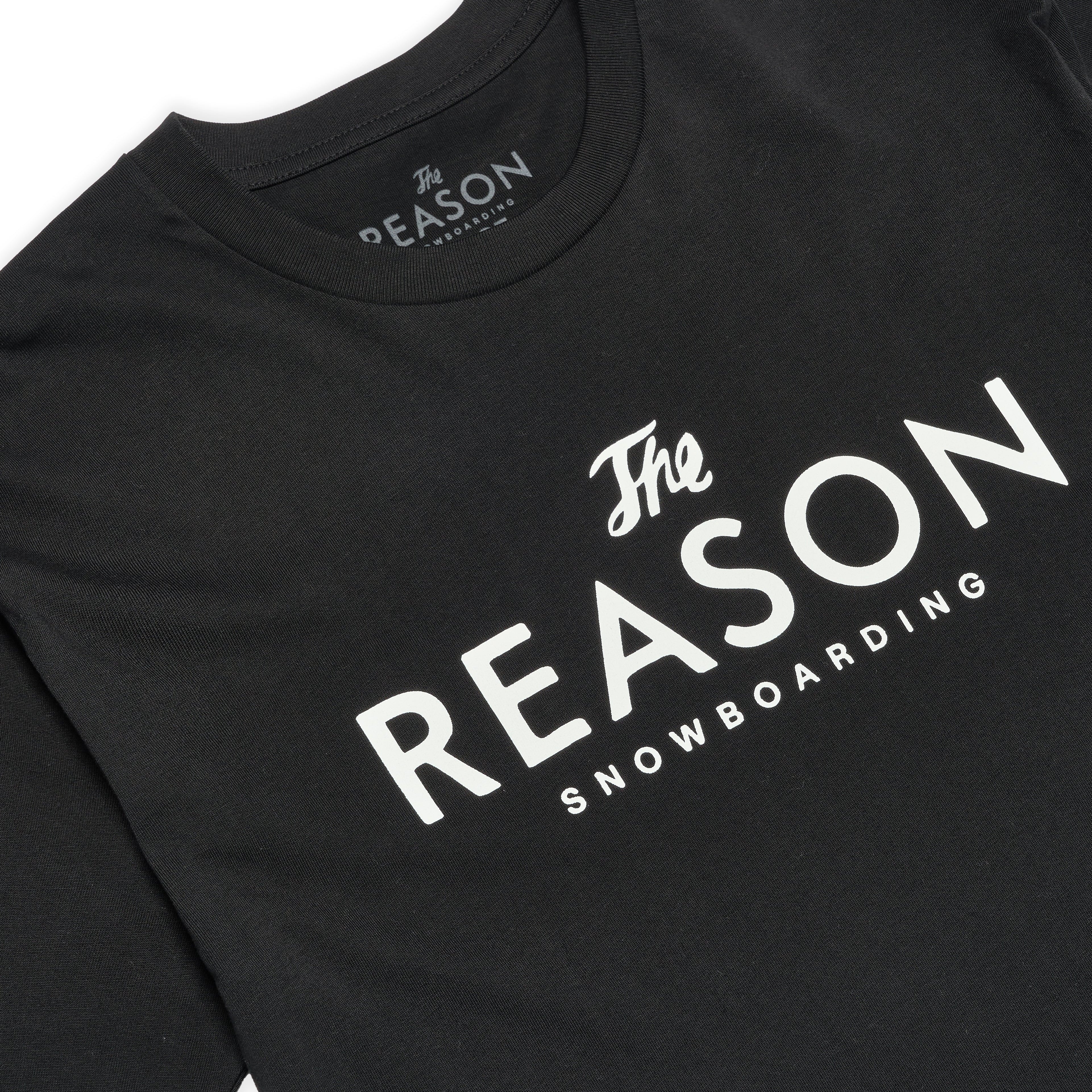 Black t-shirt with 'The Reason Snowboarding' text on a white background