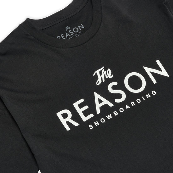 Black t-shirt with 'The Reason Snowboarding' text on a white background
