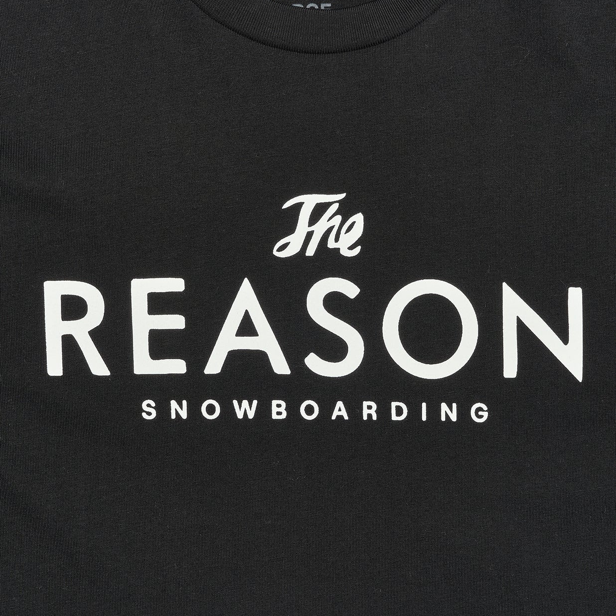 Black t-shirt with 'The Reason Snowboarding' text on a black background