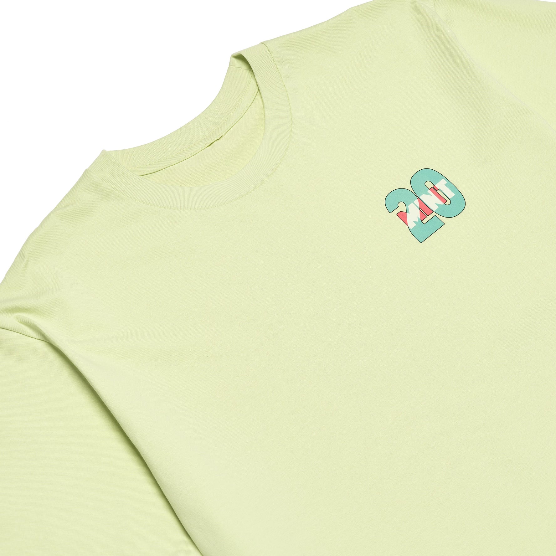 Light green t-shirt with a small logo on a white background