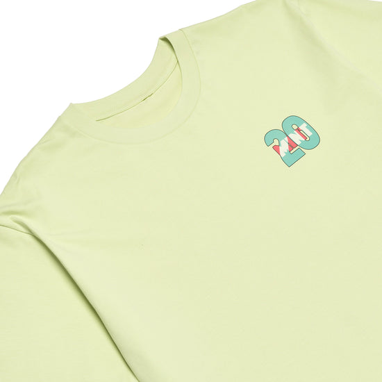 Light green t-shirt with a small logo on a white background