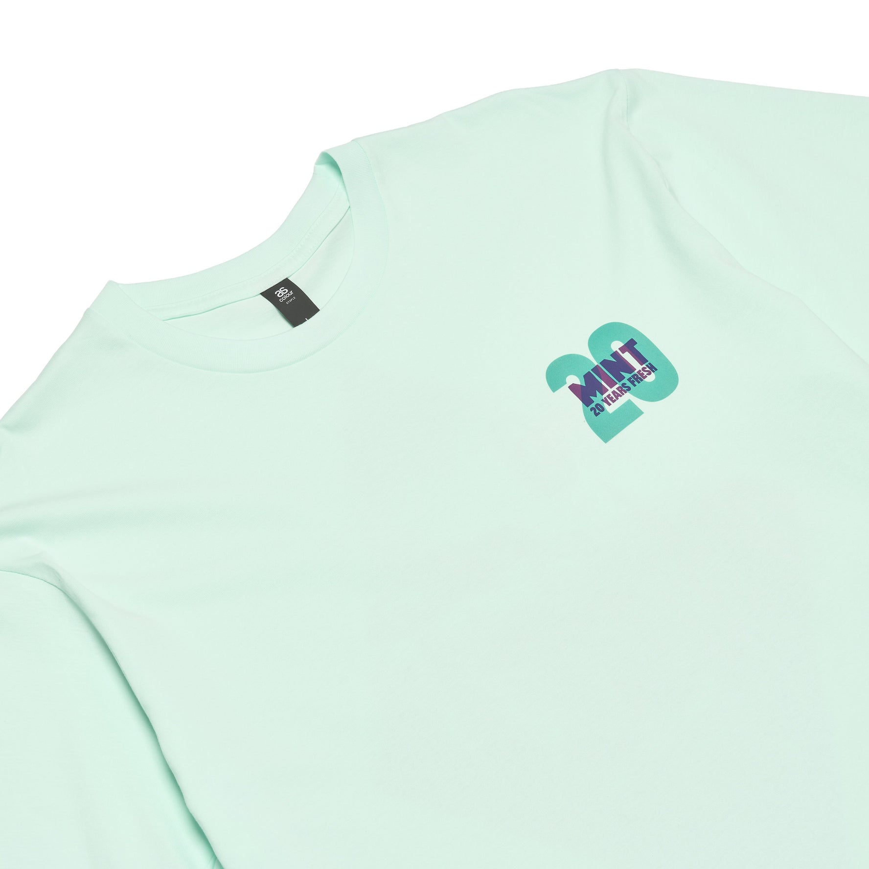 Light green t-shirt with a small graphic on a white background