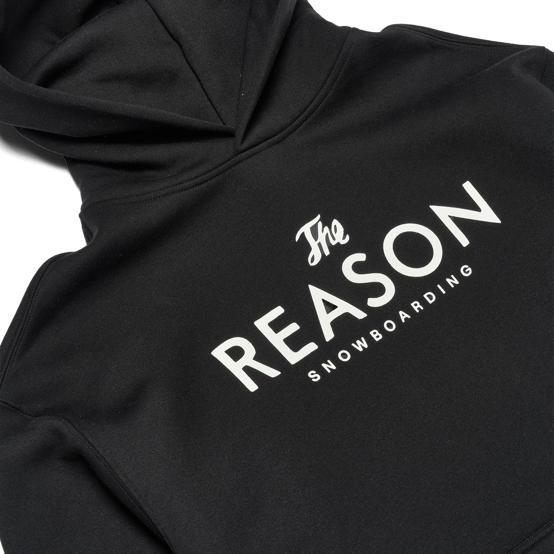 Black hoodie with 'The Reason Snowboarding' text on a white background