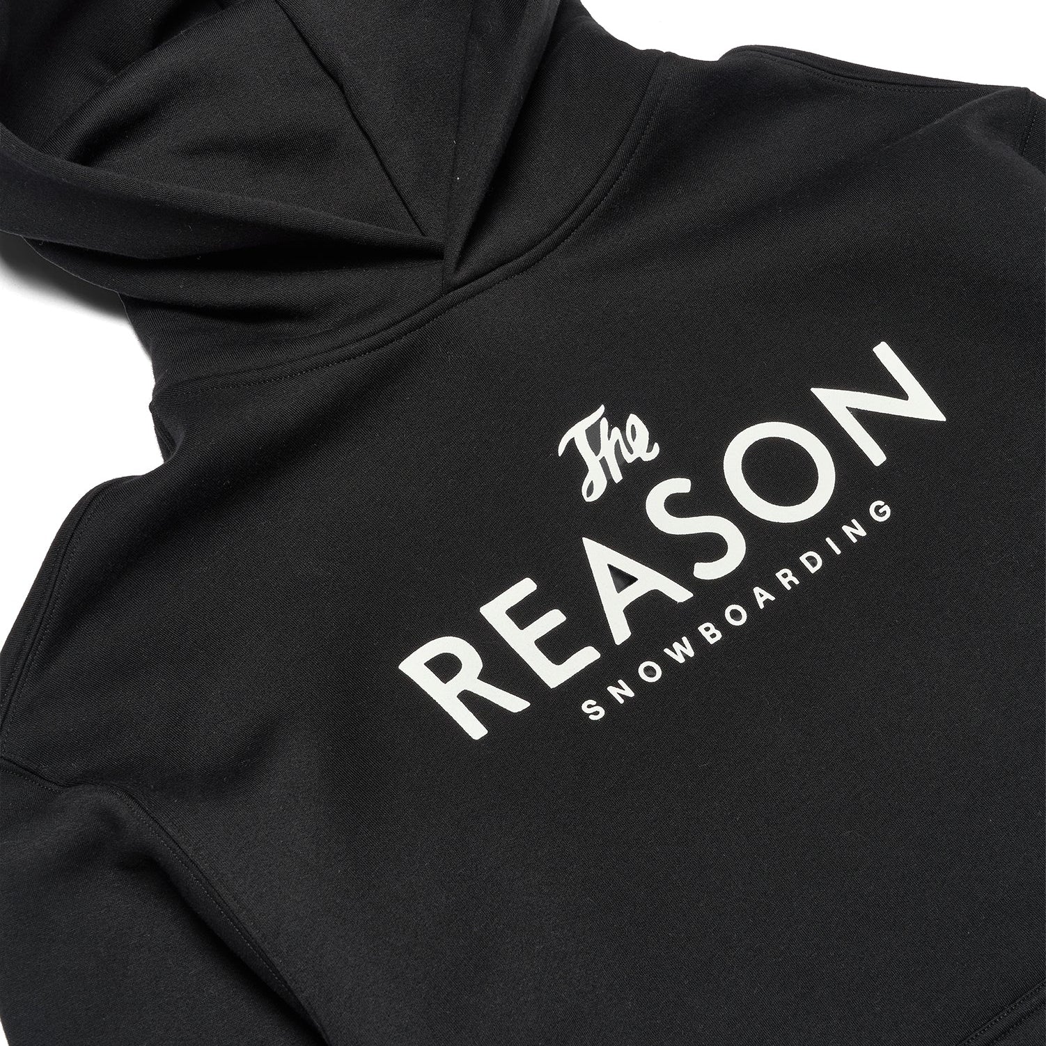 Black hoodie with 'The Reason Snowboarding' text on a white background