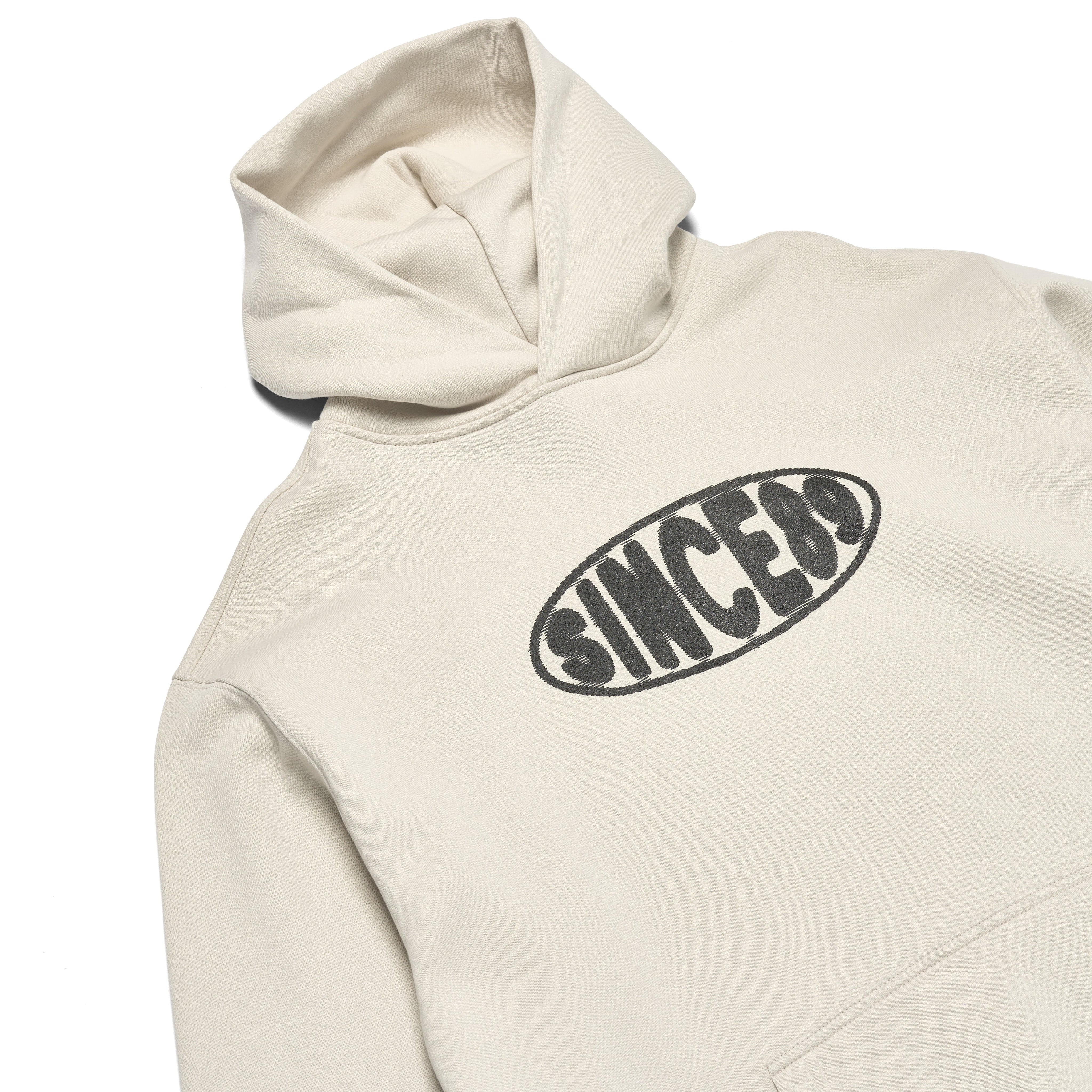 Beige hoodie with 'SINCE 89' text on a white background