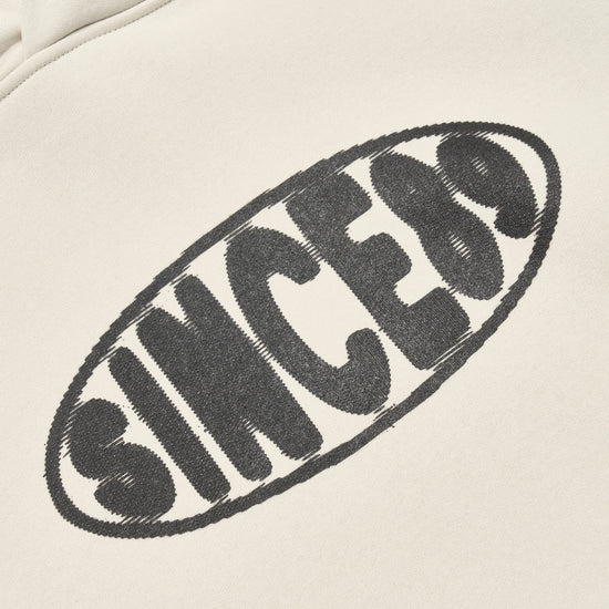 Beige hoodie with 'SINCE89' text in black on a beige background