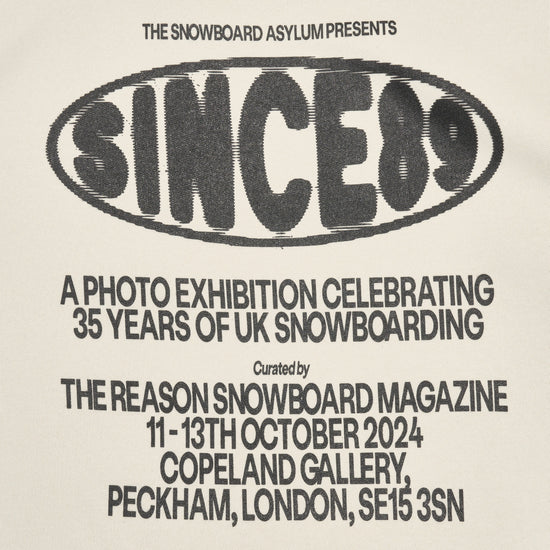 Advertisement for a photo exhibition celebrating 35 years of UK snowboarding, featuring the Snowboard Asylum logo.